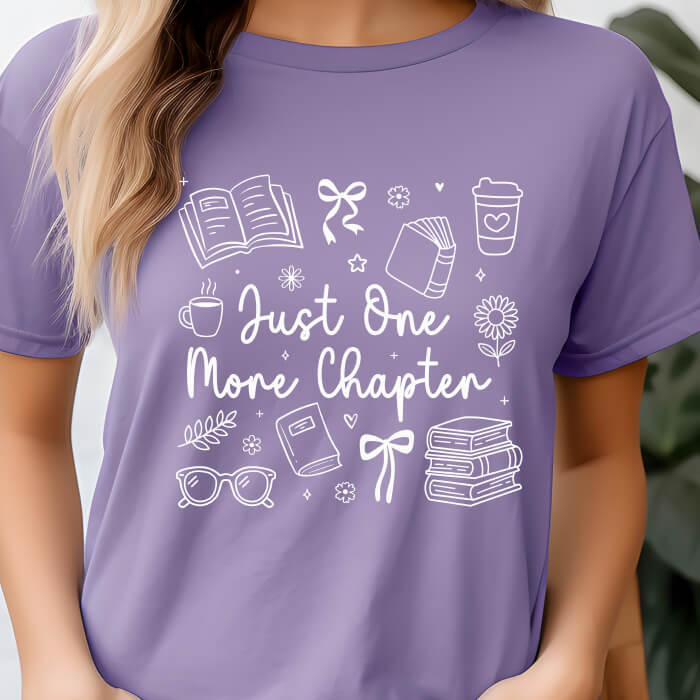 Just One More Chapter Cozy grape bookish t-shirt – cozy Comfort Colors 1717 garment-dyed tee for readers who live between chapters.