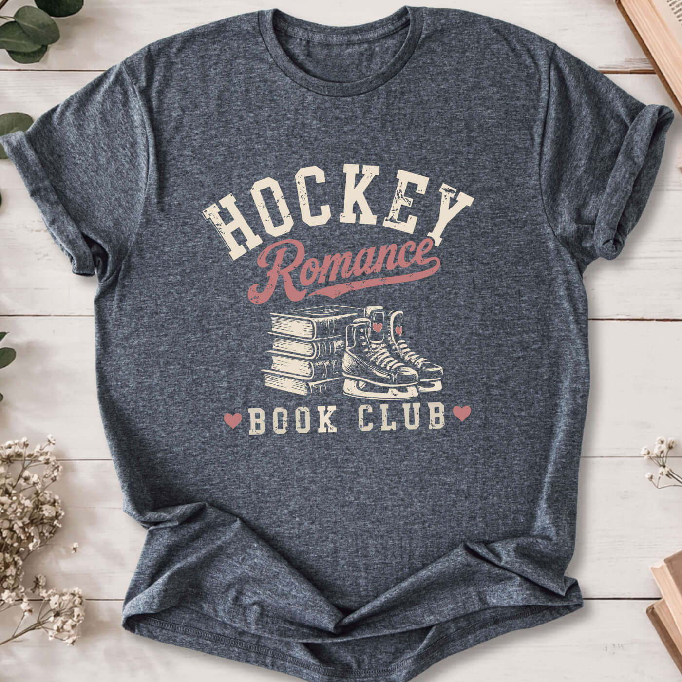 Hockey Romance Book Club t-shirt on dark heather grey Gildan 64000 featuring books and hockey skates.
