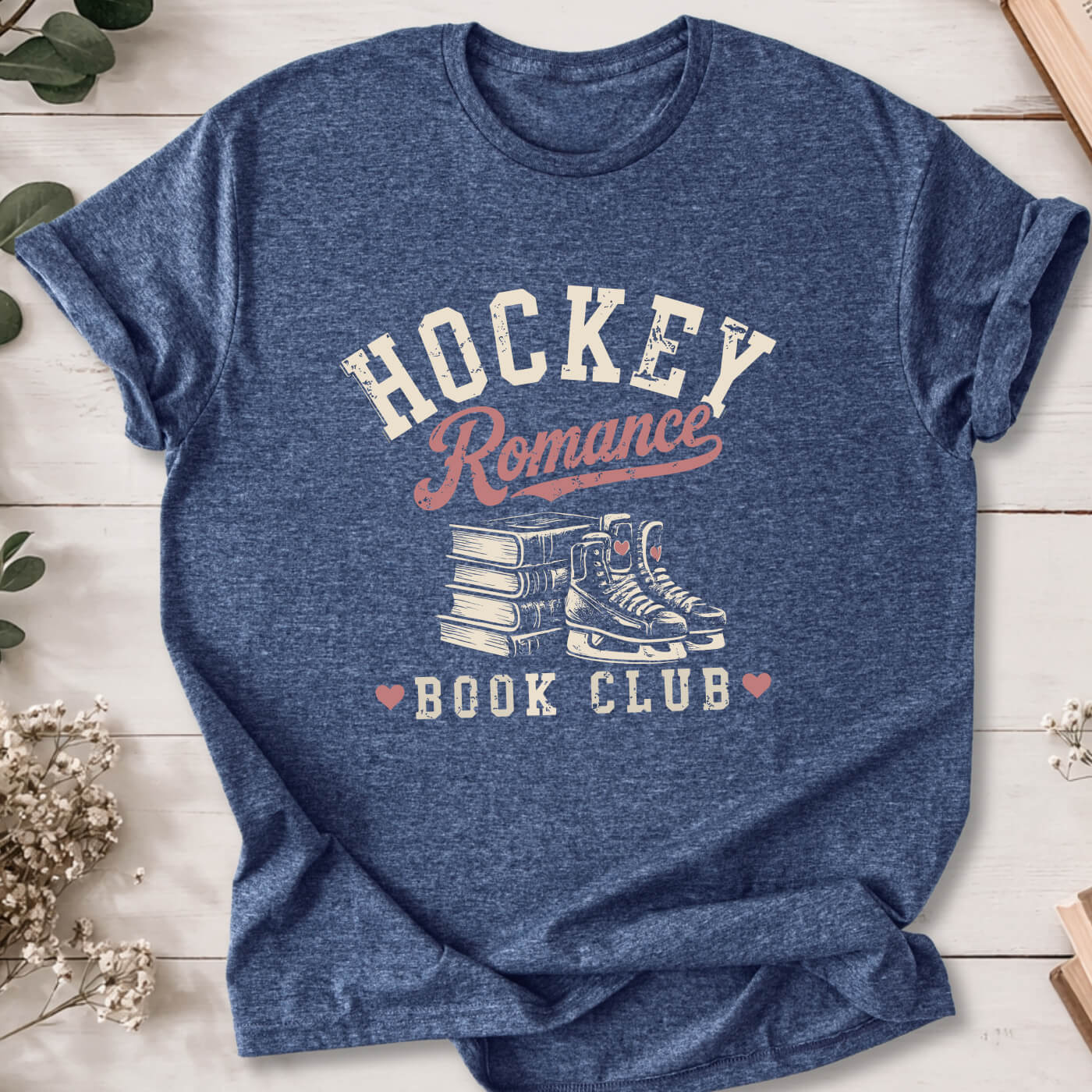 Hockey Romance Book Club t-shirt on heather navy Gildan 64000 featuring books and hockey skates.