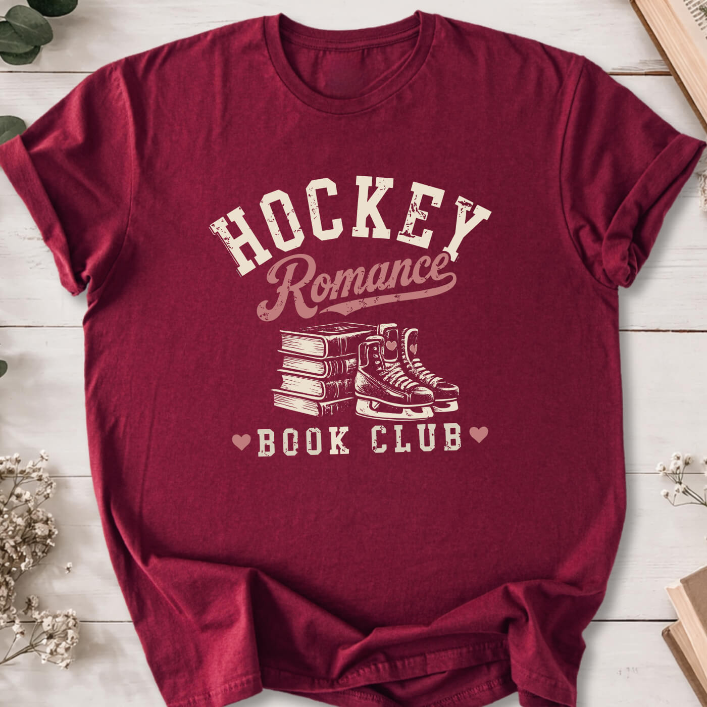 Hockey Romance Book Club t-shirt on marron Gildan 64000 featuring books and hockey skates.