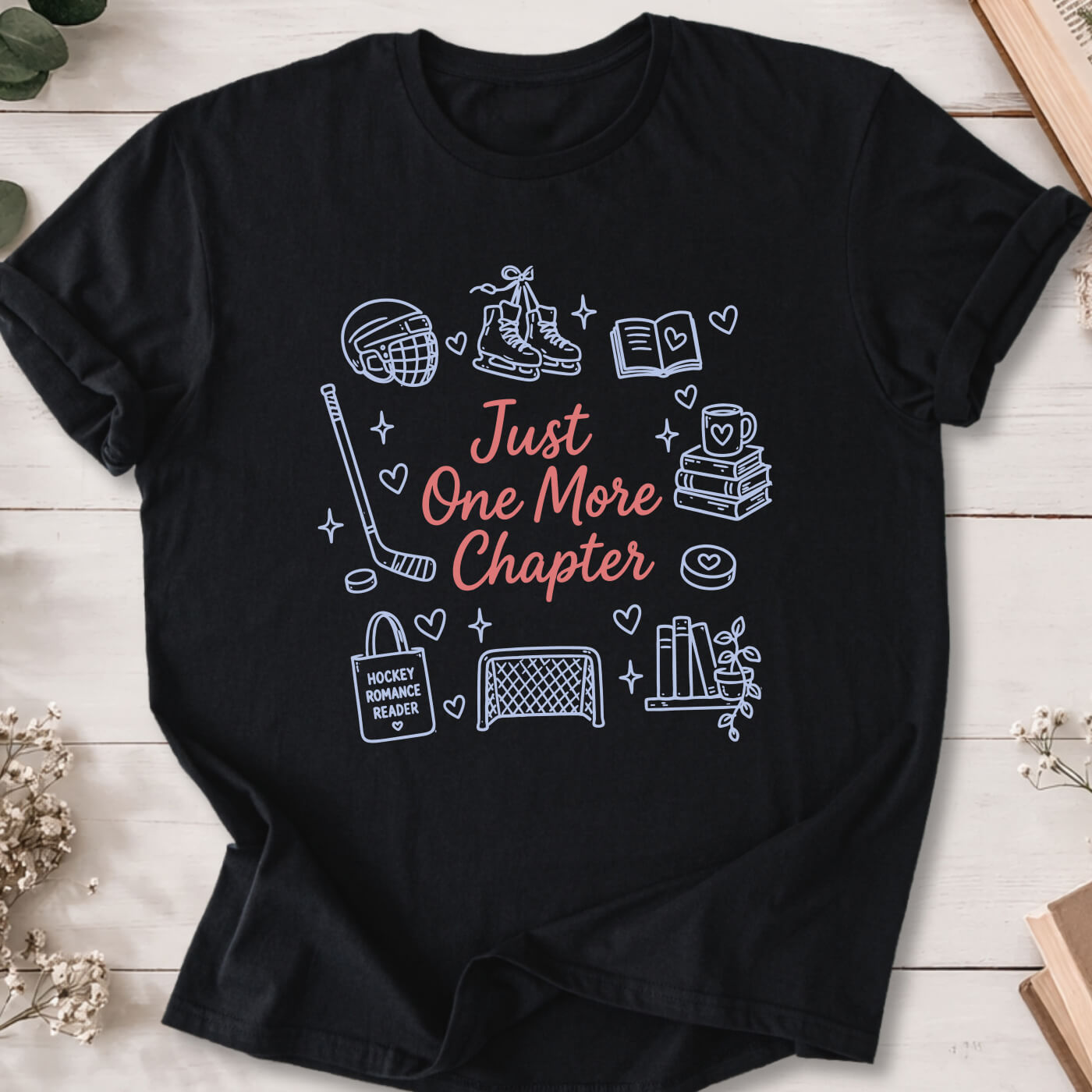 Just One More Chapter hockey romance doodle t-shirt on black Gildan 64000 with hockey, books and reader icons.