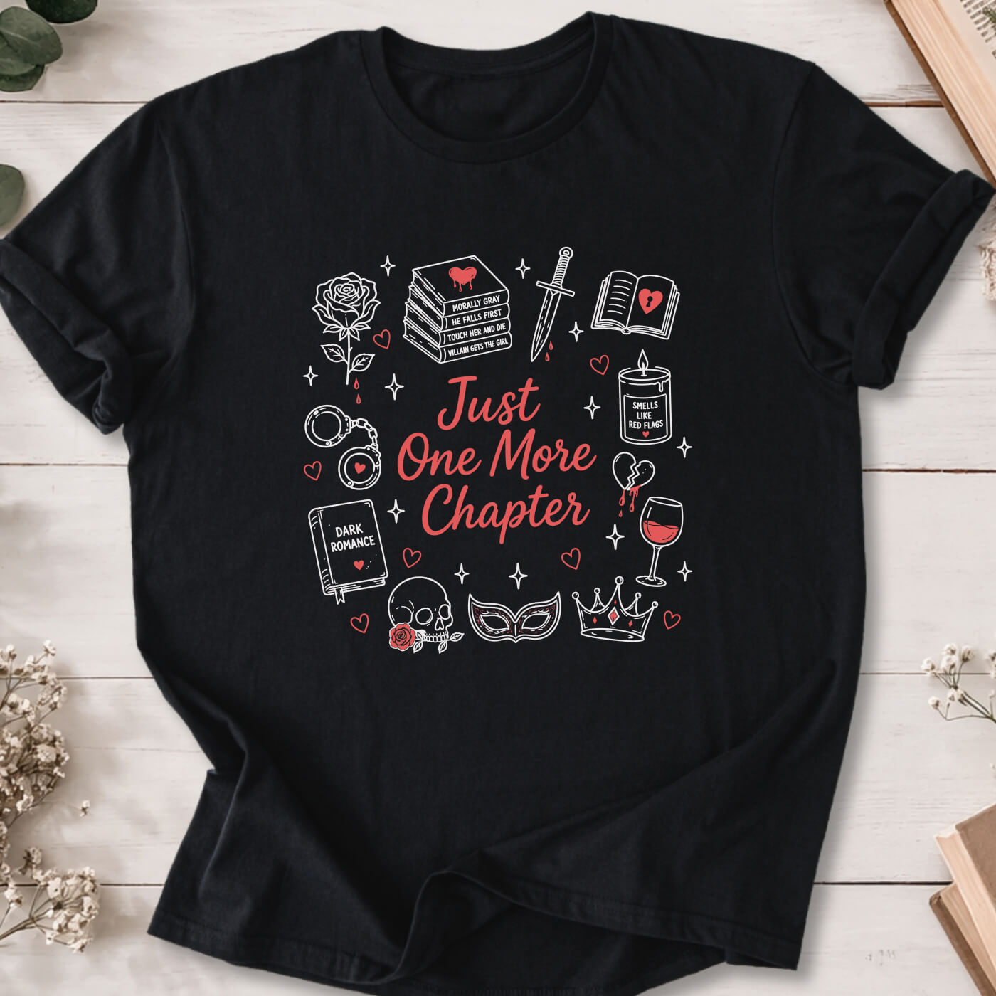 Just One More Chapter dark romance doodle t-shirt on black Gildan 64000 featuring books, skull, roses and reader icons.