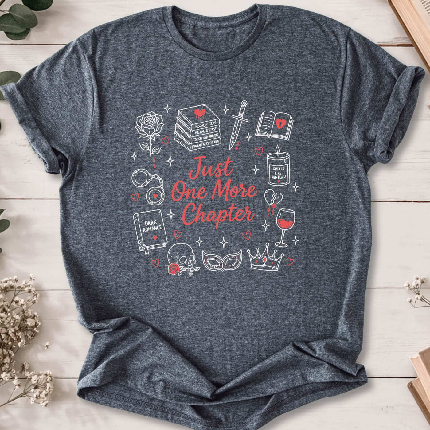 Just One More Chapter dark romance doodle t-shirt on dark heather grey Gildan 64000 featuring books, skull, roses and reader icons.