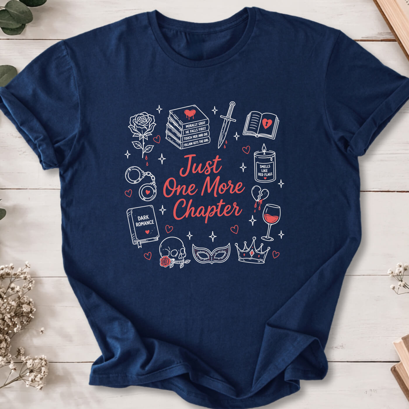 Just One More Chapter dark romance doodle t-shirt on Navy Gildan 64000 featuring books, skull, roses and reader icons.