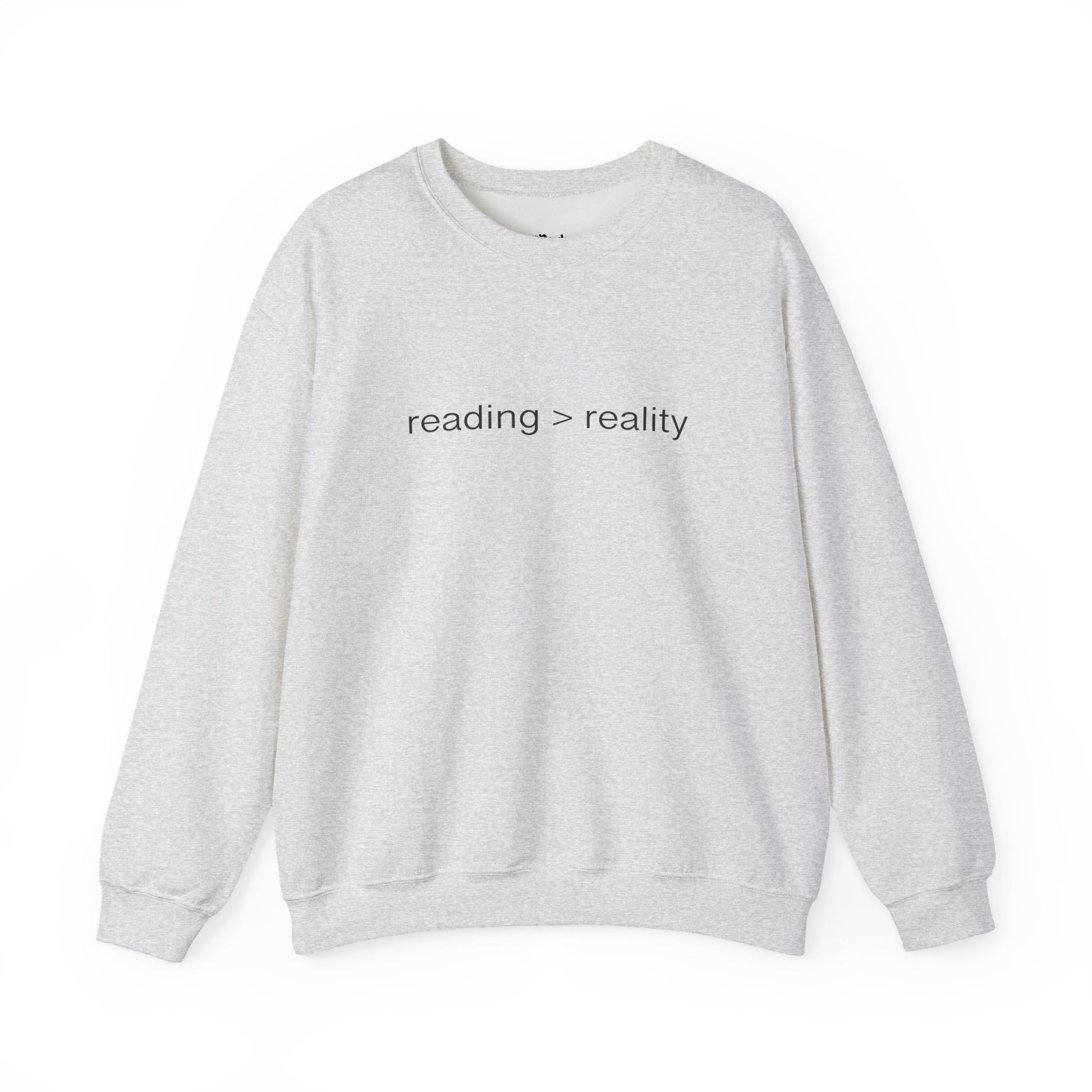 Reading > Reality light grey/ash bookish sweatshirt – cozy Gildan 18000 crewneck for readers who live between chapters and adore bookish vibes.