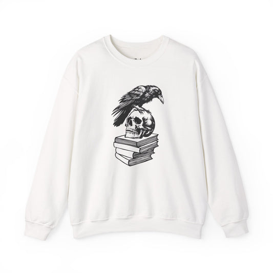 Crow and Skull on a Stack of Books white dark romance sweatshirt – cozy Gildan 18000 crewneck made for readers who fall for villains, crave danger, and love twisted love stories.
