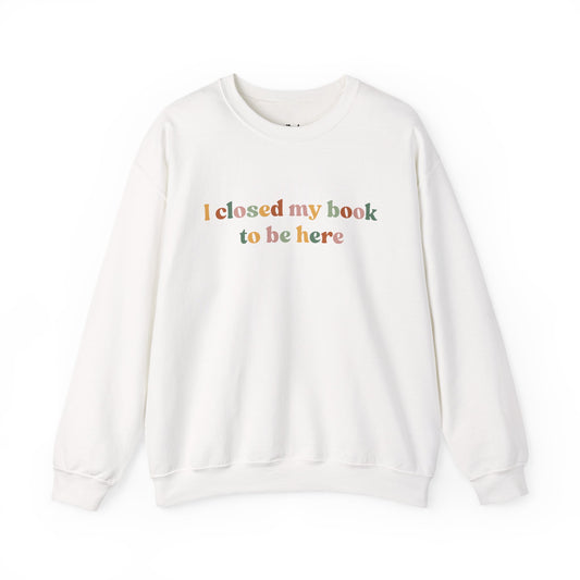I closed my book to be here white bookish sweatshirt – cozy Gildan 18000 crewneck for readers who live between chapters and adore bookish vibes.